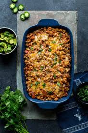 Layered chicken enchilada casserole is assembled, one layer at a time. Layered Chicken Enchilada Casserole Healthy Seasonal Recipes