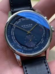 wts wtt repost nomos zurich weltzeit worldtimer watchexchange nomos horology time keeper