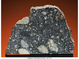 A meteorite found in antarctica, alha 81005, is from the moon! Full Slice Of A Moon Rock Meteorites Lunar Lot 49170 Heritage Auctions