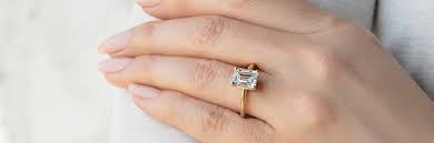 10 Most Beautiful Emerald Cut Diamond Settings of All Time - Diamond Nexus