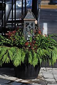 Purchasing all your supplies is definitely cheaper (unless you go crazy) than buying a planter already put together. 58 Best Creative Winter Container Design Ideas Winter Planter Garden Containers Christmas Urns
