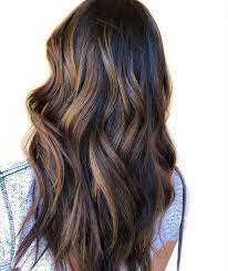 On most hair, henna will only darken, but on very dark brown or black hair, henna can lighten and leave reddish highlights. The Complete Guide To Highlights For Brown Hair Redken