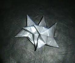 How To Make A Ninja Power Star Out Of Paper Duct Tape Ninja Star Ninja Crafts Diy Ninja Costume Ninja Costume