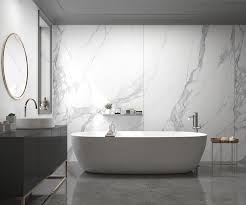 From kitchens to laundry rooms, bathrooms and hallways, black and white tiles are a design component that is certainly making a statement in the house. Bathroom Tile Ideas Use Large Tiles On The Floor And Walls Realgres