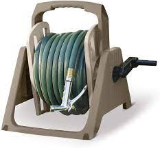 Garden hose storage pots come in a variety of materials, shapes, and colors. Amazon Com Suncast 100 Ft Tote Or Wall Mount Resin Garden Hose Reel With Lid Taupe Suncast Hose Reel Garden Outdoor