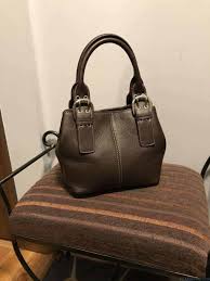 Examine the bag for brand tags, authenticity labels, and serial numbers. Tignanello Genuine Pebble Leather Medium Brown Purse Hand Bag Jewelry