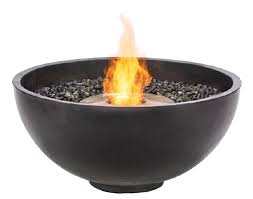An old propane tank recycled into a fire pit for our garden. Brown Jordan Fires Emigh S Outdoor Living