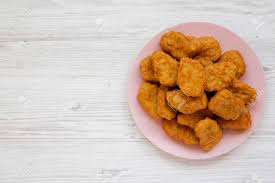 Mar 04, 2021 · chicken nuggets come in many different varieties and can be seasoned in a number of different ways. Chicken Nuggets On A Pink Plate On A White Wooden Background Stock Photo Picture And Royalty Free Image Image 125386567