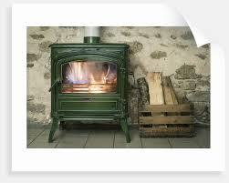 See more ideas about wood stove, wood burning stove, wood. A Fire In A Green Wood Buring Stove Posters Prints By Corbis