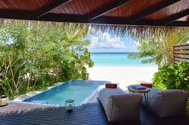 This villa offers great views of sunrise or sunset. Beach Villa Maldives Beach Pool Villa Grand Park Kodhipparu