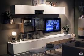 They're usually designed around supporting a tv this stand also does well stylewise with its simple design and plenty of color options to match your room's decor. Tastefully Space Savvy 25 Living Room Tv Units That Wow