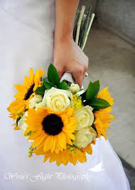 Wedding flowers sunflowers daisies wedding. Sunflower Wedding Bouquet I Love The Brightness Of The Sunflowers With The Soft Yellow Roses Sunflower Wedding Bouquet Sunflower Wedding Sunflowers And Roses
