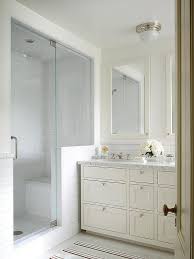 White And Cream Bathroom Features A Cream Washstand Topped With Gray And White Marble Fitted With His And Her Si Cream Bathroom Stylish Bathroom White Bathroom