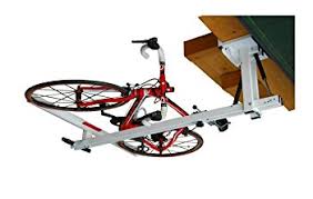 Lifts bikes up and out of the way ideal for garages with ceilings up to 12'. Indoor Bike Rack Guide Storage For Wall Ceiling Floor