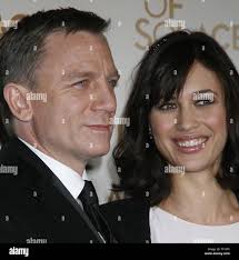 Olga kurylenko and daniel craig hi-res stock photography and images