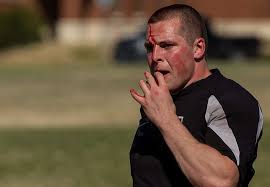 Cadet Ryan McCollum of Warren, Oh., suffers a bloody