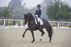 She has the best time of 58.65 seconds. All About Kira