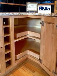 If using the corner cabinet hinges, install the hinges according to the manufacturer's installation instructions. 5 Solutions For Your Kitchen Corner Cabinet Storage Needs