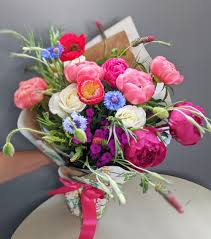We're family owned and operated,. Wrapped Bouquet Southern Blossom Charlotte Florist And Flower Delivery