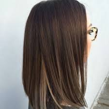 The shade of auburn nearly borders on black making for a dark chocolate look in this shiny brown hair color picture. Get Crazy Creative With These 50 Peekaboo Highlights Ideas Hair Motive Hair Motive