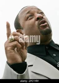 Community activist Najee Ali speaks to reporters concerning a fatal auto  crash involving R&B singer Brandy, in Los Angeles' Crenshaw District,  Tuesday, Jan. 30, 2007. Ali and others are urging Los Angeles