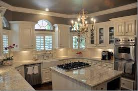 Grey kitchen walls with cream cabinets. What A Beautiful Kitchen The Color Of The Granite Is Bianco Romano Color Of The Walls Is Stardust By Benjamin Moore Love Home Sweet Home Kitchen Remodel