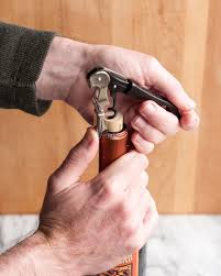 Need to open a bottle of wine but you haven't got a corkscrew? How To Open A Bottle Of Wine Using A Wine Key Corkscrew Recipe Wine Key Wine Opener Wine Bottle
