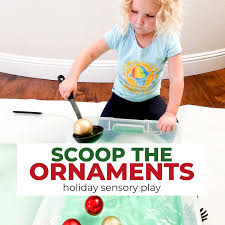 Winter activities outdoors for babies and toddlers: Ornament Scooping Holiday Sensory Ideas For Toddlers Toddler Approved