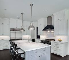 Whether you're looking to expand your counter space for food prep or need a little extra storage, kitchen islands are a chic and practical solution. Blue Gray Kitchen Island With Ralph Lauren Montauk Xi Pendants Transitional Kitchen