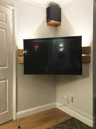 Therefore, making a diy back panel will be your safe bet. Tv Wall Mount Ideas 14 Simple And Modern Tv Wall Mount Ideas For Living Room Awesome Place Of Tele Modern Corner Tv Stand Diy Tv Stand Corner Tv Wall Mount