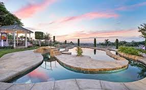 If you had a lazy river in your backyard, would you ever leave home? Backyard Lazy River Pool Ideas Designing Idea