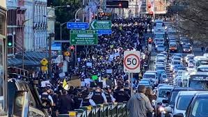 By richard baker, noel towell and simone fox koob. Massive Crowds Protest Covid 19 Lockdowns In Sydney And Melbourne