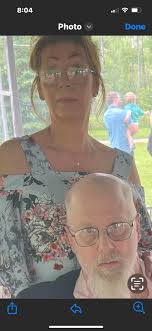 Can someone please remove the bar background of this picture please? My  brother wearing glasses passed away last year. He is pictured with my  husband and this picture was taken in 1989.