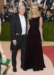 Steve Jobs Widow Laurene Powell At Met Gala With Apple Ceo Tim Cook Met Gala Gala Burgundy Dress