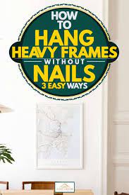 Last but not least, hang your frame on the wall! How To Hang Heavy Frames Without Nails 3 Easy Ways Home Decor Bliss