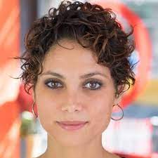 Long curly pixie with subtle highlights one of our favorite short shag haircuts is actually a long, wavy pixie style. 30 Standout Curly And Wavy Pixie Cuts