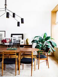 The Dos And Don Ts Of Mastering The Mismatched Dining Chair Trend Mid Century Modern Dining Room Dining Room Decor Modern Vintage Dining Room