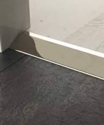 Use the transition trim to separate between tiles and other floor coverings. Metal Transition Strips Premier Quality Carpet Trims Uk