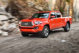 An arrow pointing up and to the right. Comparison Toyota Tacoma Double Cab Trd Pro 2016 Vs Toyota Fortuner 4x4 Gx 2016 Suv Drive