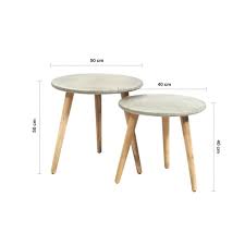 For a statement piece in front of the sofa, find one in an. Ellie Round Outdoor Poly Cement And Timber Table Balcony Set