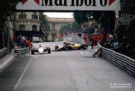 Colourful umbrellas were held up against grey skies. Monaco Accident At The Tip Top Poeticsofspeed