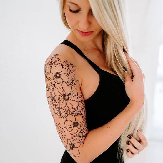Alli K Inspired botanical half sleeve tattoo
