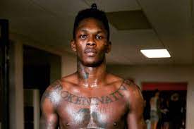 View complete tapology profile, bio, rankings. Israel Adesanya S 7 Tattoos Their Meanings Body Art Guru