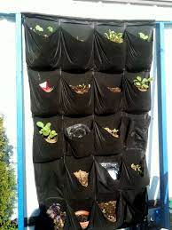 Diy Vertical Garden Sewn Out Of Landscaping Fabric By Me Vertical Garden Diy Vertical Herb Garden Landscape Fabric