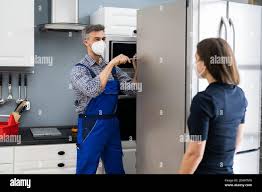 Refrigerator repair hi-res stock photography and images - Alamy