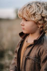wild hair soft heart eyes the color of a penny always curious forever my  little boy