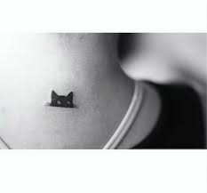 Peeking Black Cat Tattoo On The Neck Black Cat Tattoos Cat Tattoo Designs Tattoos