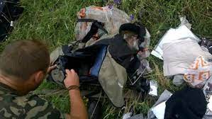 The faces of the aussie mh17 victims who never made it home, as report finds russian military did shoot. Image Shows Mh17 Victim S Ring Eyed By Rebel Al Arabiya English