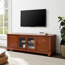 Elegant trellis details on the glass doors, intricately cast door pulls, turned bun feet, and architectural. Crosley Furniture Alexandria 60 Low Profile Tv Stand