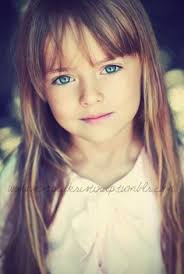 The hair cascades down with loose tresses giving the style a waterfall look. Little Girl Bangs On Pinterest Little Girl Haircuts Girl Haircuts Little Girl Bangs